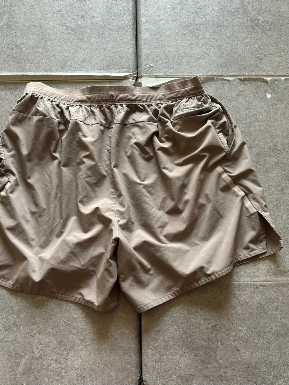 Tan nike running shorts